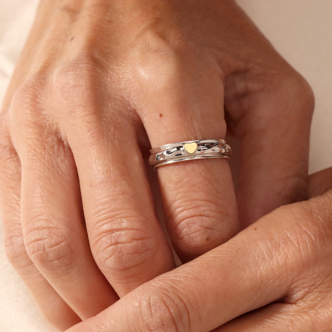Sandria Heart Spinner Ring in sterling silver and 14k gold, view 5