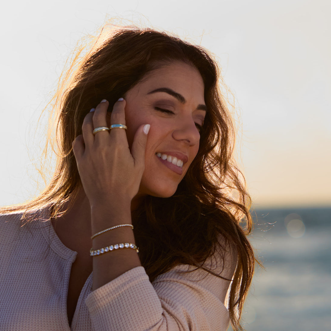 Rosa Spinner Ring, styled with the Veronica Spinner Ring and tennis bracelets