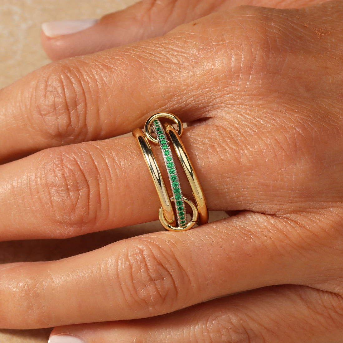 Bellanca Spinner Ring in 14k gold filled and sterling silver with emerald green stones, view 2