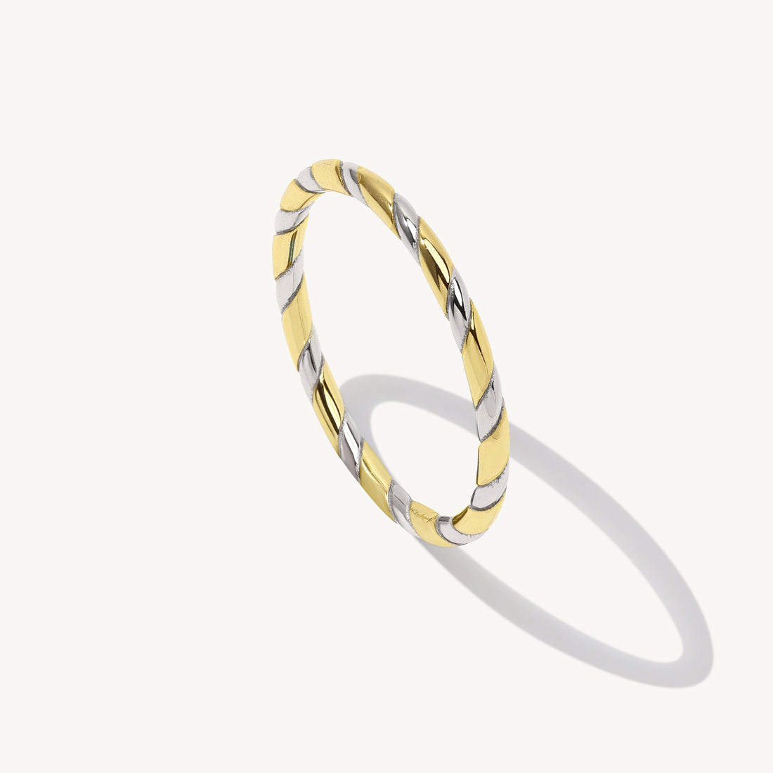 Verna Twist Ring in sterling silver and 14k gold