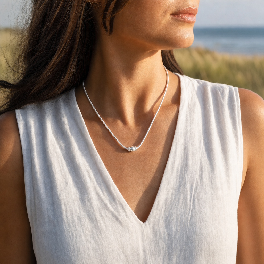 Coastal Ball Necklace in All Sterling Silver, worn by a model, Ideaure photo
