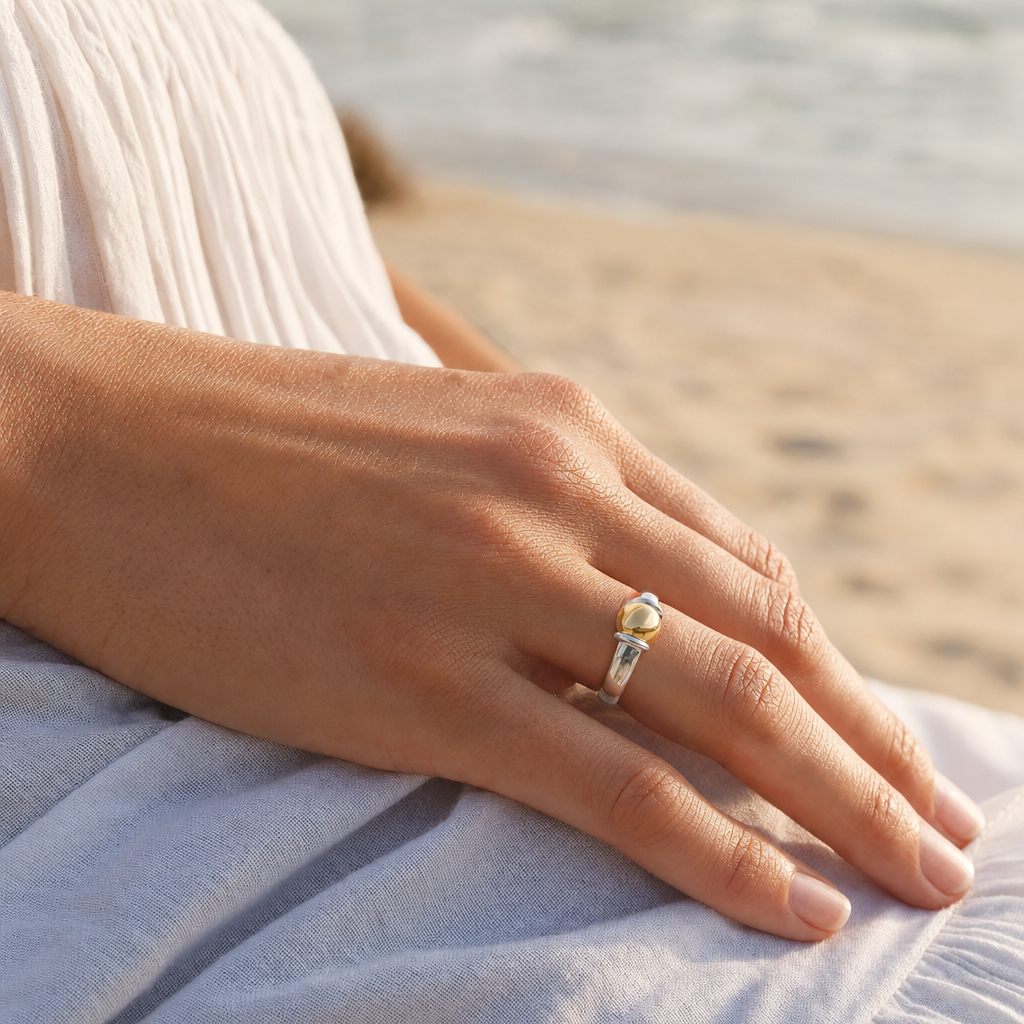 Coastal Ball Ring in Sterling Silver with 14k Gold Filled Ball, worn by a model, Ideaure photo