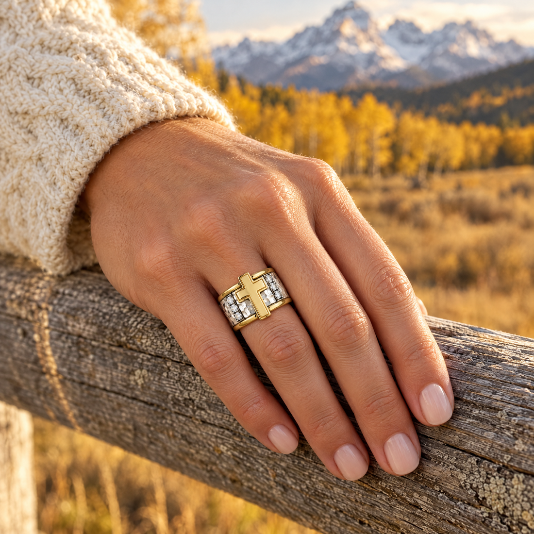 Cross Column Ring worn on a hand, cedar rail and golden aspens, Ideaure photo
