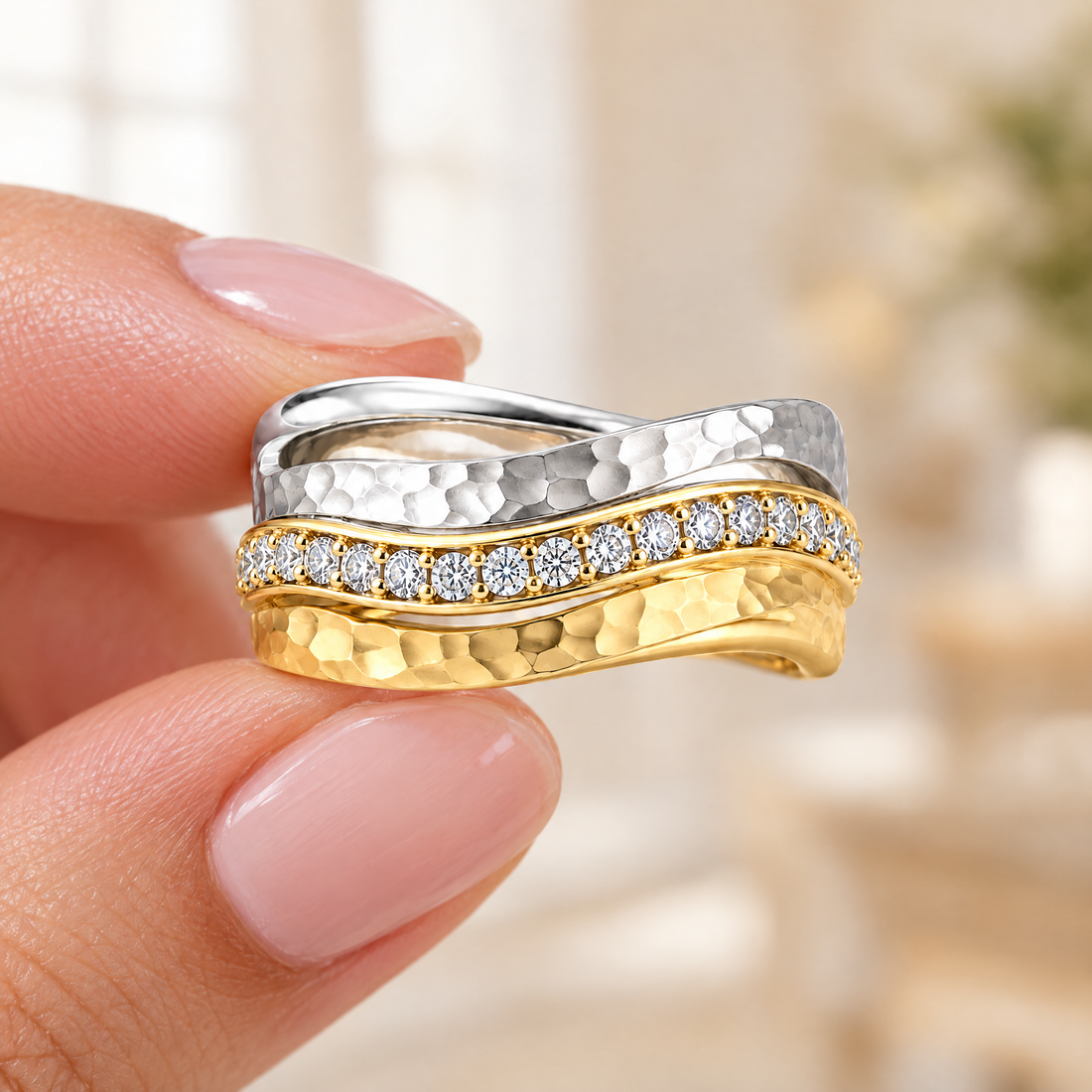 Crossing Wave Pavé Ring held in fingertips