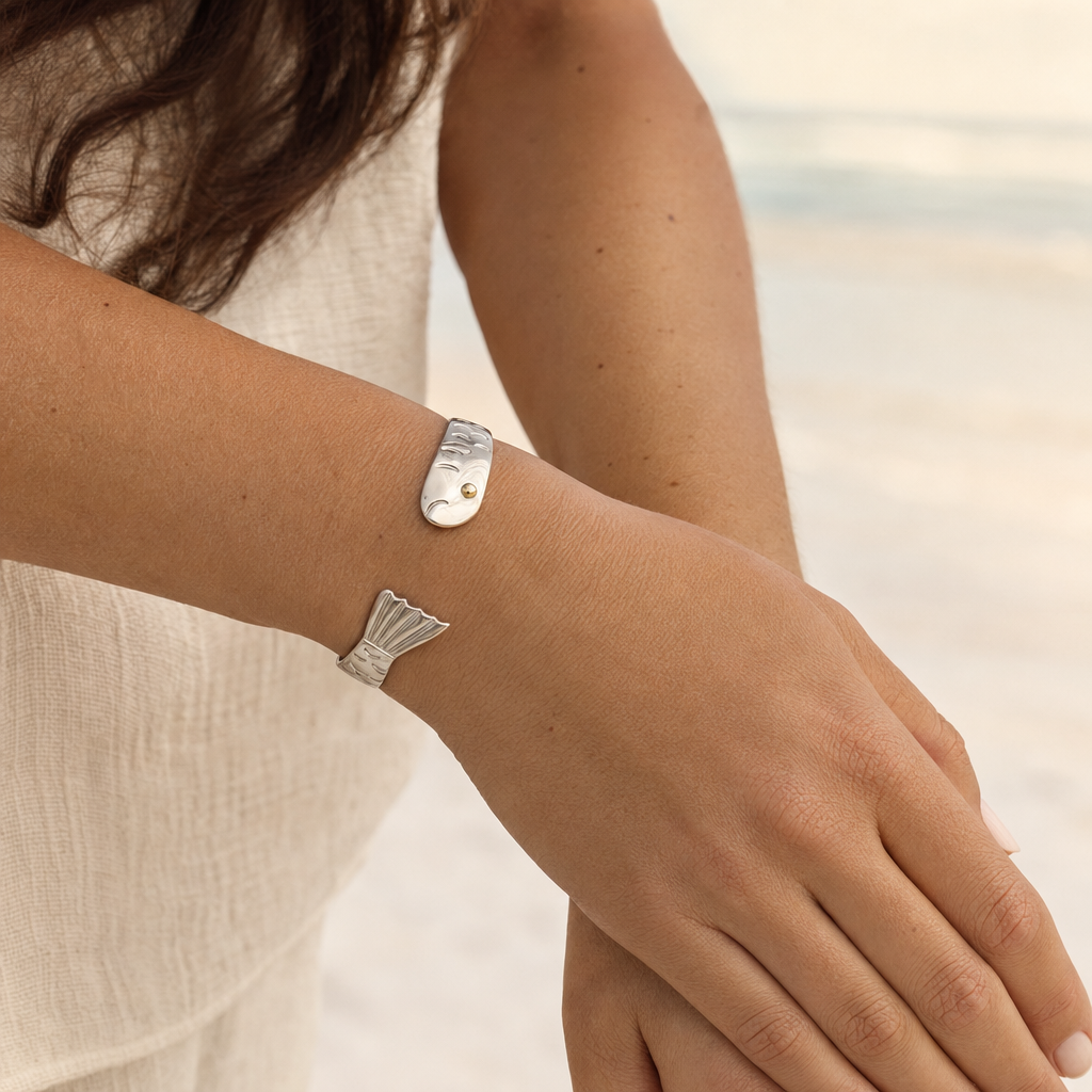 Harbor Fish Cuff Bracelet in Sterling Silver with 14k Gold Filled Eye, worn by a model, Ideaure photo