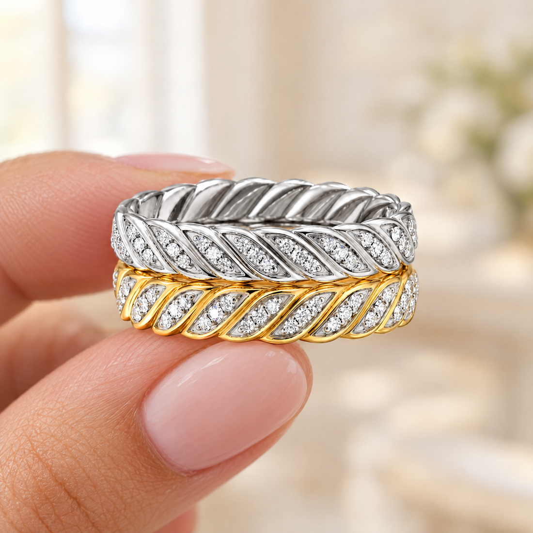 Leaf Pavé Braid Ring held in fingertips