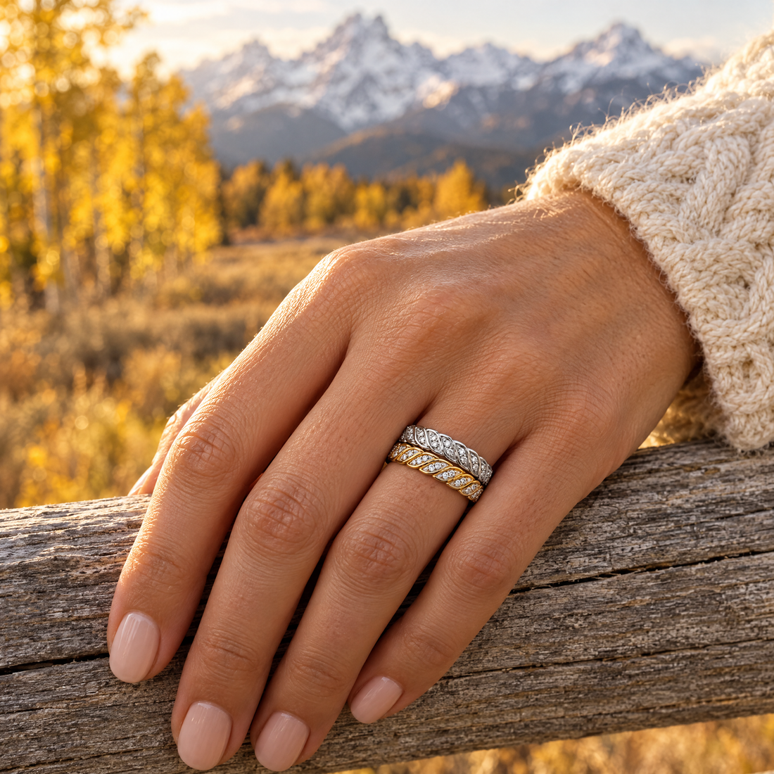 Leaf Pavé Braid Ring worn on a hand, cedar rail and golden aspens, Ideaure photo