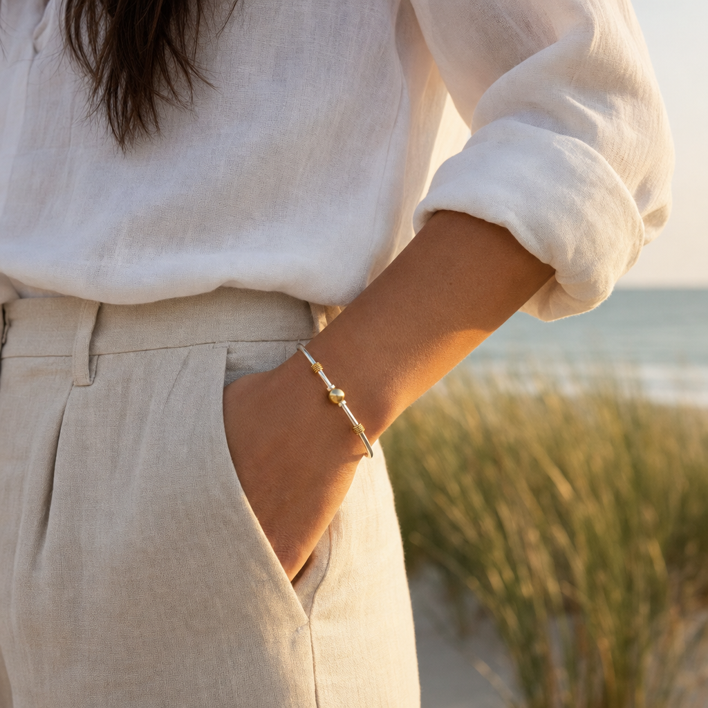 Nantucket Rope Ball Bracelet in Sterling Silver with 14k Gold Filled Ball and Rope Wrap, worn by a model, Ideaure photo