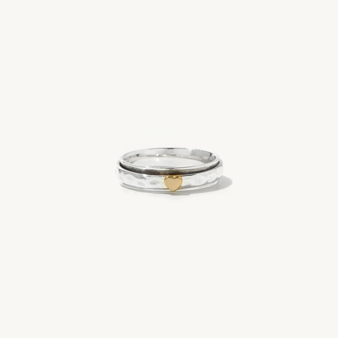 Sandria Heart Spinner Ring in sterling silver and 14k gold